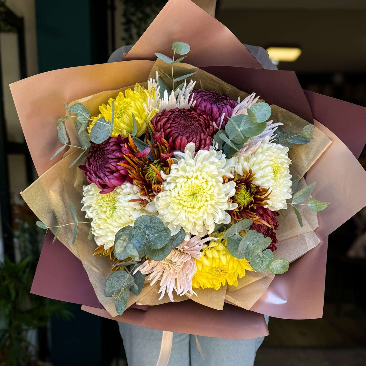 Buchet crizantemă multicolor — buchet multicolor văzut de sus